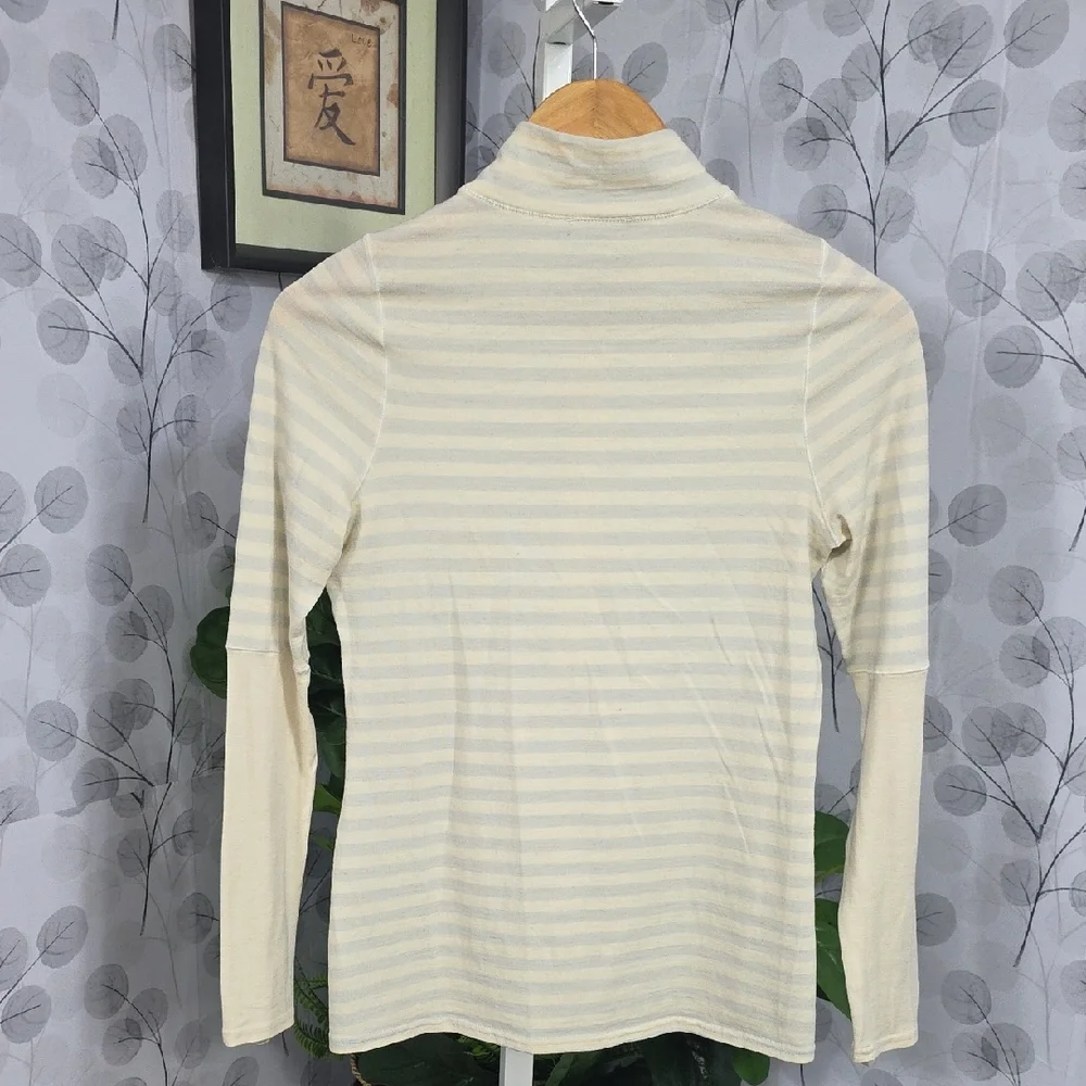Patagonia Women's Merino 3 Midweight Zip-Neck top in a striped pattern.  - Picture 8 of 9